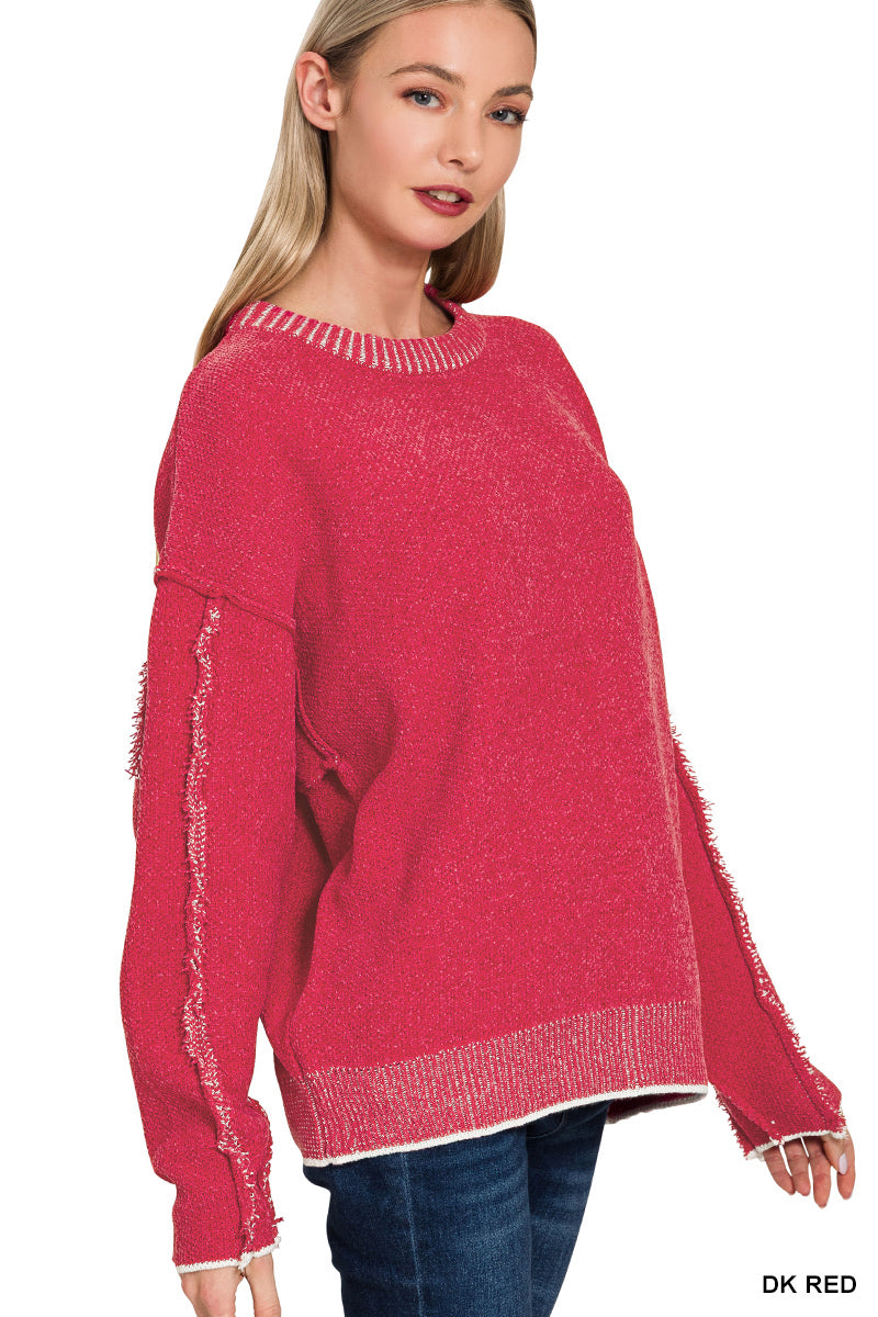 Exposed seam round neck sweater